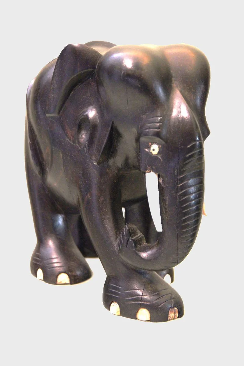 Olifant in ebbenhout - Diversen › Figuren - €125.00 - 23cm hoog, 23cm lang
ca 1900