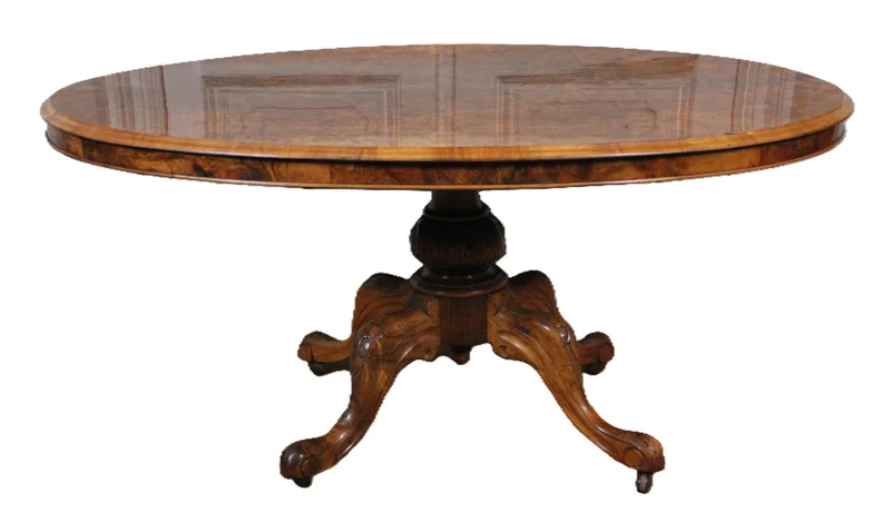 Ovale breakfasttafel - Meubel › Tafels - €1750.00 - Ovale tafel op centrale poot in notenhout met een blad in openboekmotief van notenwortelhout.
Gepolitoerd op oude wijze.
148 x 110cm; 70cm hoog
Victoriaanse periode: ca 1850-1870