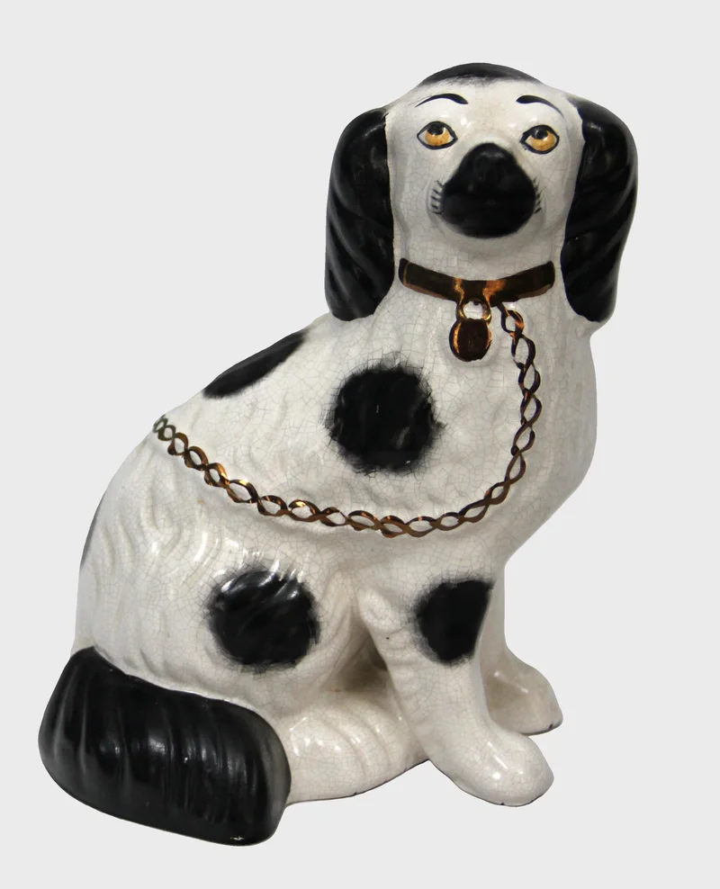 Staffordshire hond - Porselein › Figuren - Porselein figuur in typische Staffordshirestijl.
23cm hoog
Laat 19e eeuw.

